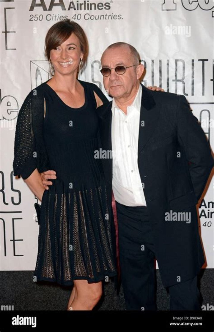 Bernie Taupin and Heather Lynn Hodgins Kidd walking on the red carpet