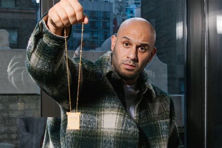 Greg Yuna Collabs with SLAM to Create 'The Basketball Bible' Gold Chain