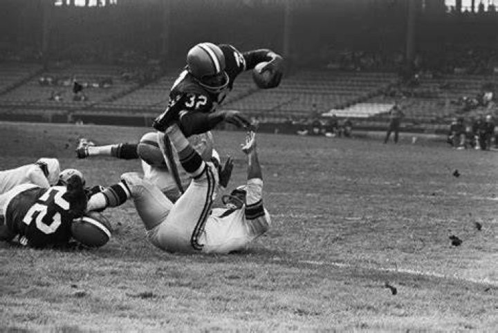 (Original Caption) Jim Brown, fullback of Cleveland Browns, sits in